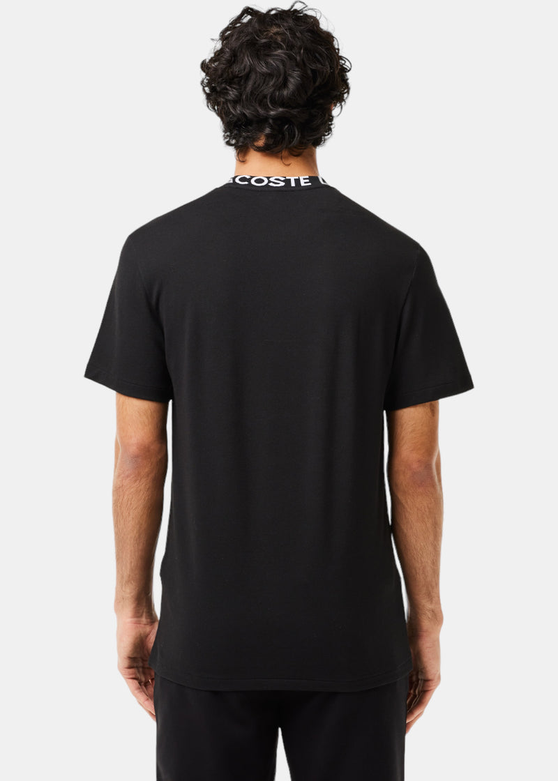 T-shirt Lacoste logo sur le col noir 2K24