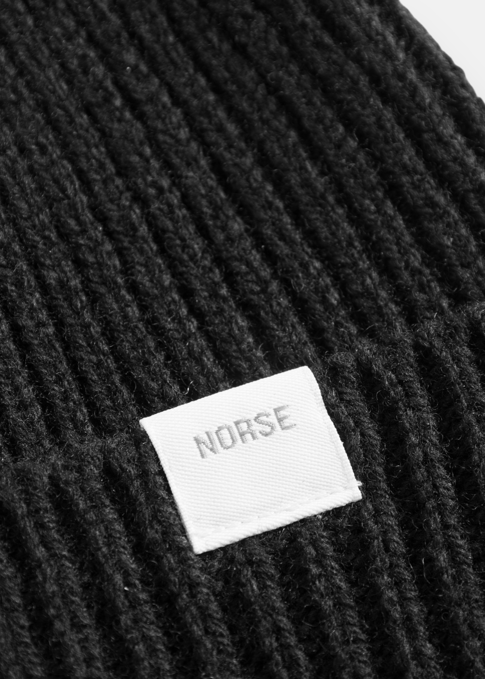zoom maille et logo bonnet norse merino 