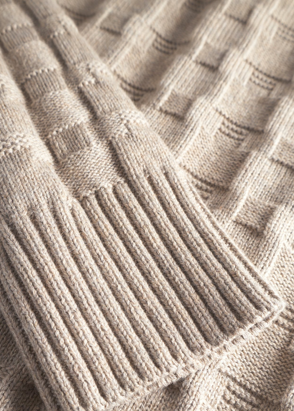 détail maille tressée pull norse
