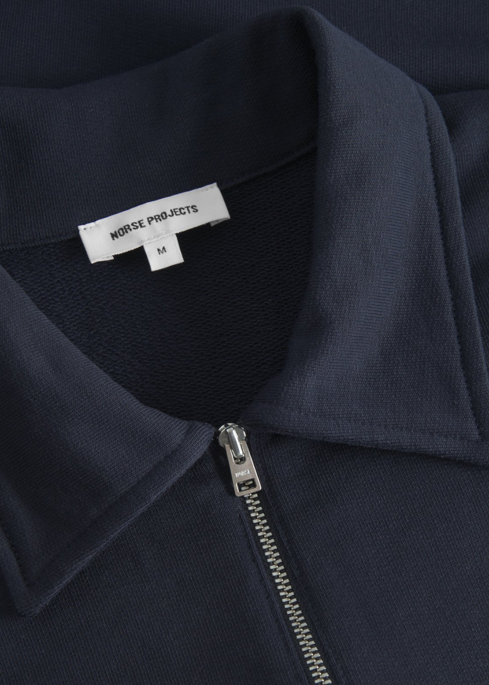 détail fermeture demi zip norse