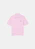 vue de face sur fond blanc du Polo Lacoste en Maille bouclée - rose