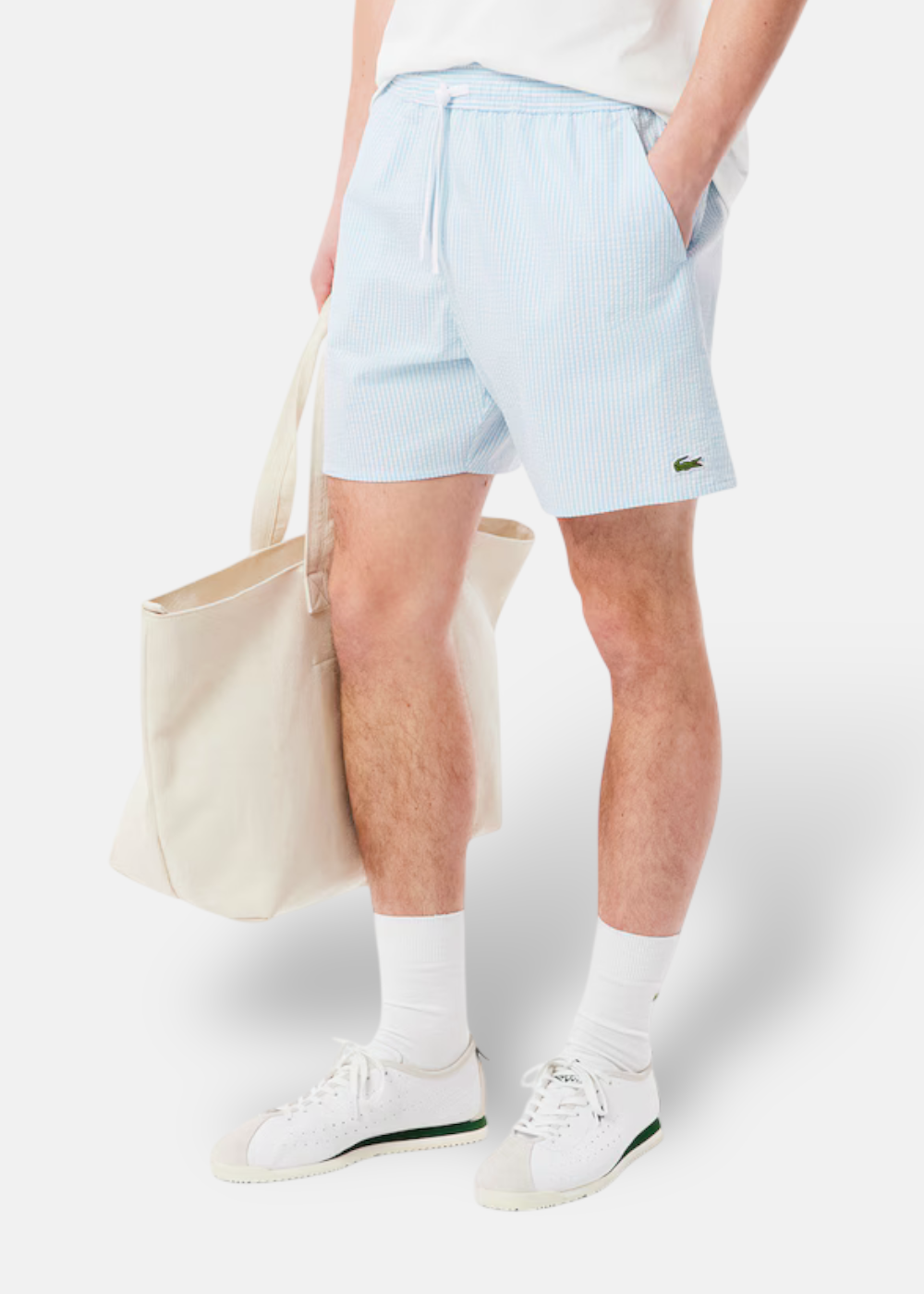 Short de bain Lacoste a rayure bleu vue de face
