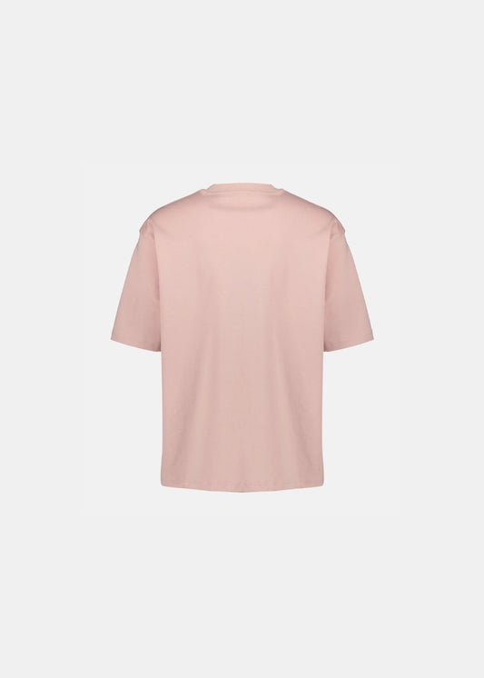 Vue de dos du t-shirt Diesel rose pâle , montrant la coupe oversize