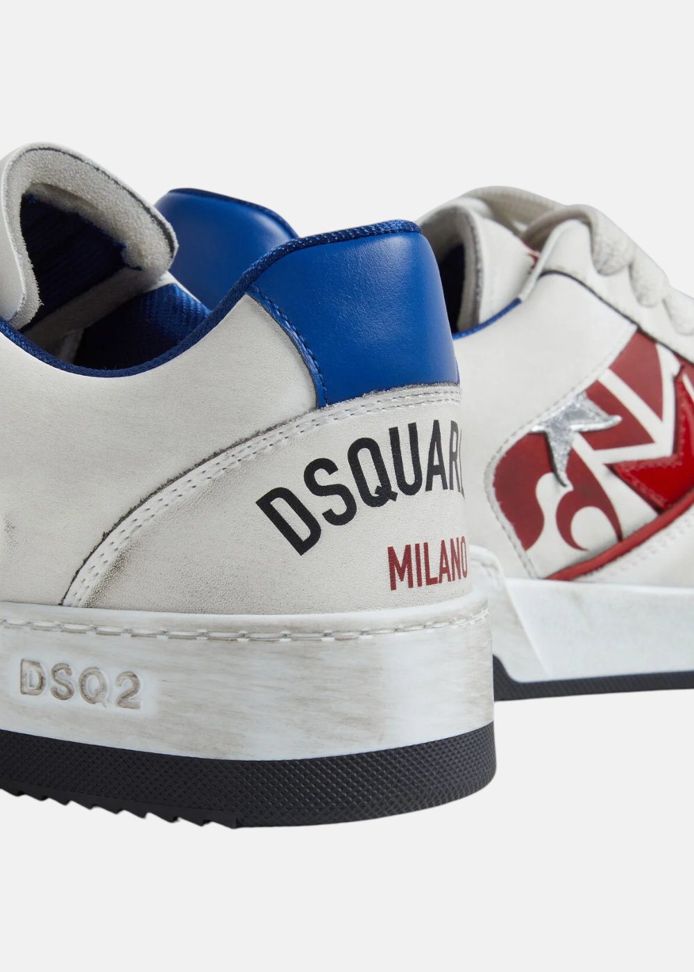 Gros plan sur le talon d'une basket Dsquared2 Spiker mettant en avant le marquage Dsquared2 Milano et l'effet usé de la semelle.