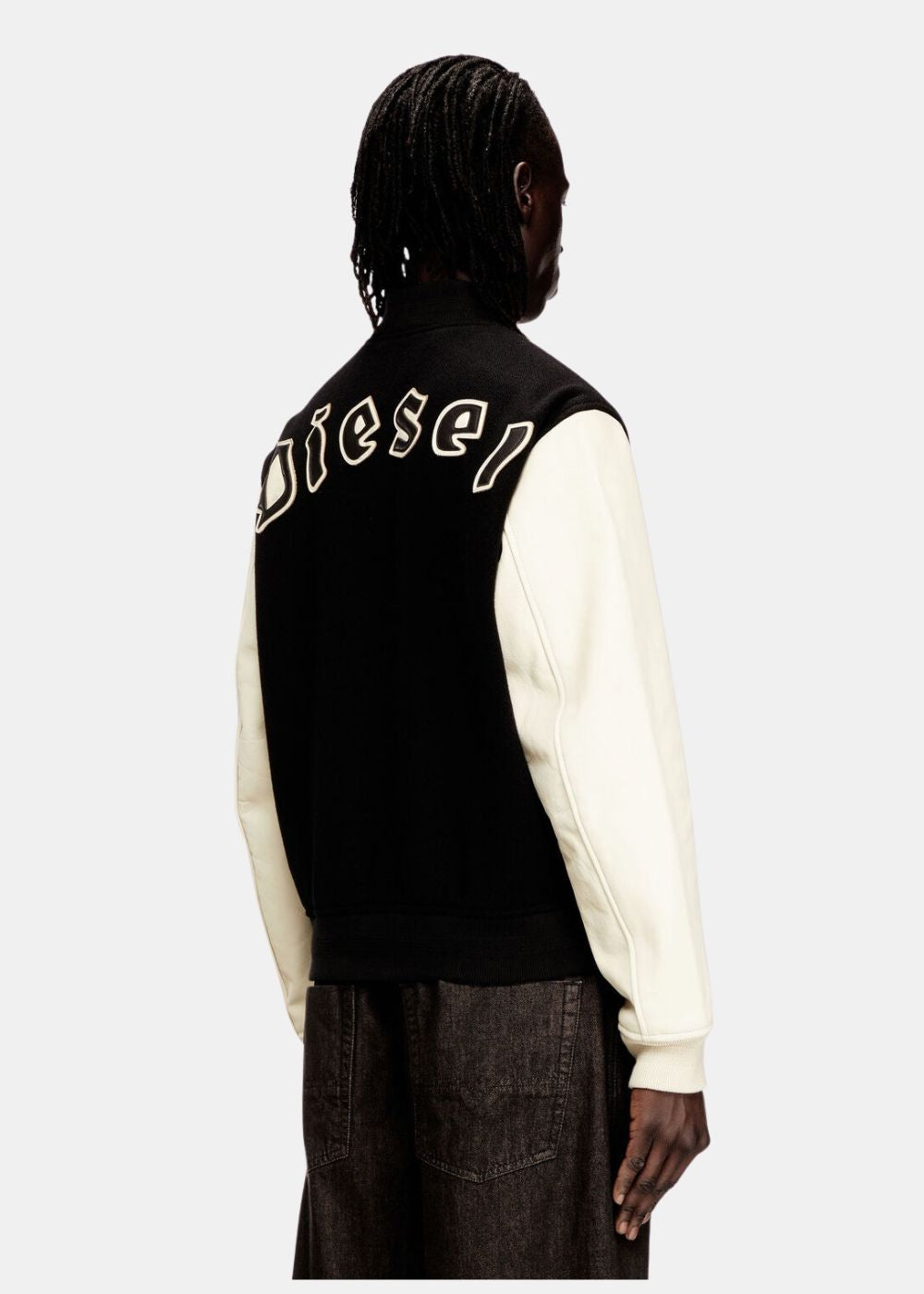 Vue de dos du blouson Diesel montrant le grand lettrage "Diesel" appliqué en relief sur le corps en laine.