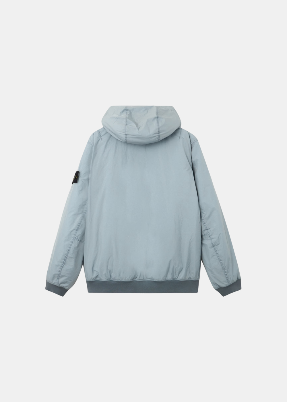 Bomber technique gris clair posé à plat, vue de dos (8_2.jpg), mettant en avant la coupe épurée et les finitions élastiques à la base.