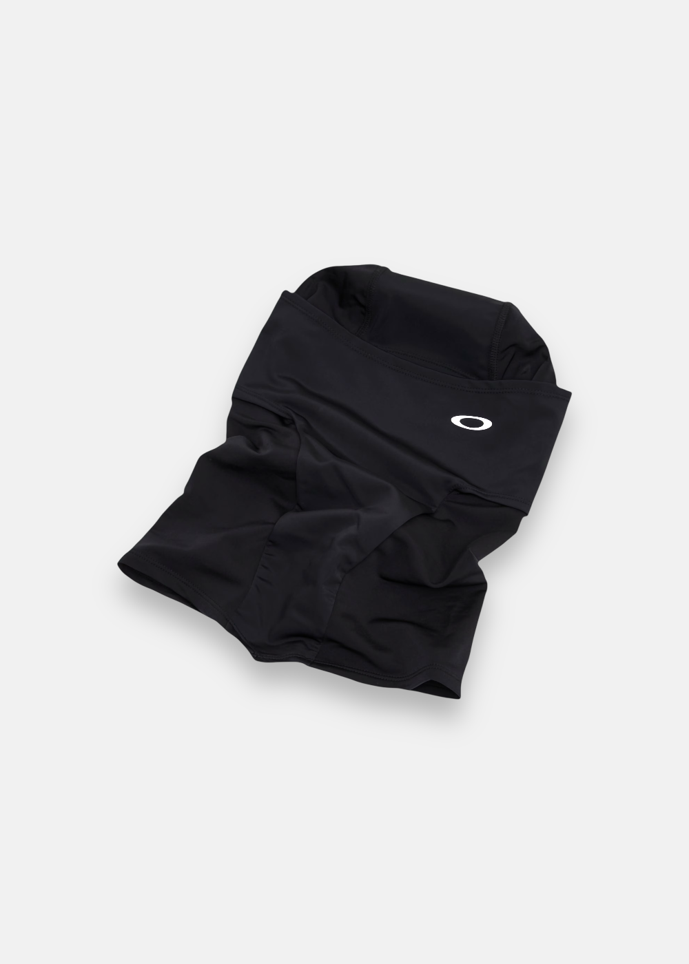 Vue à plat de la cagoule de ski Oakley Backwoods Balaclava noire en tissu technique