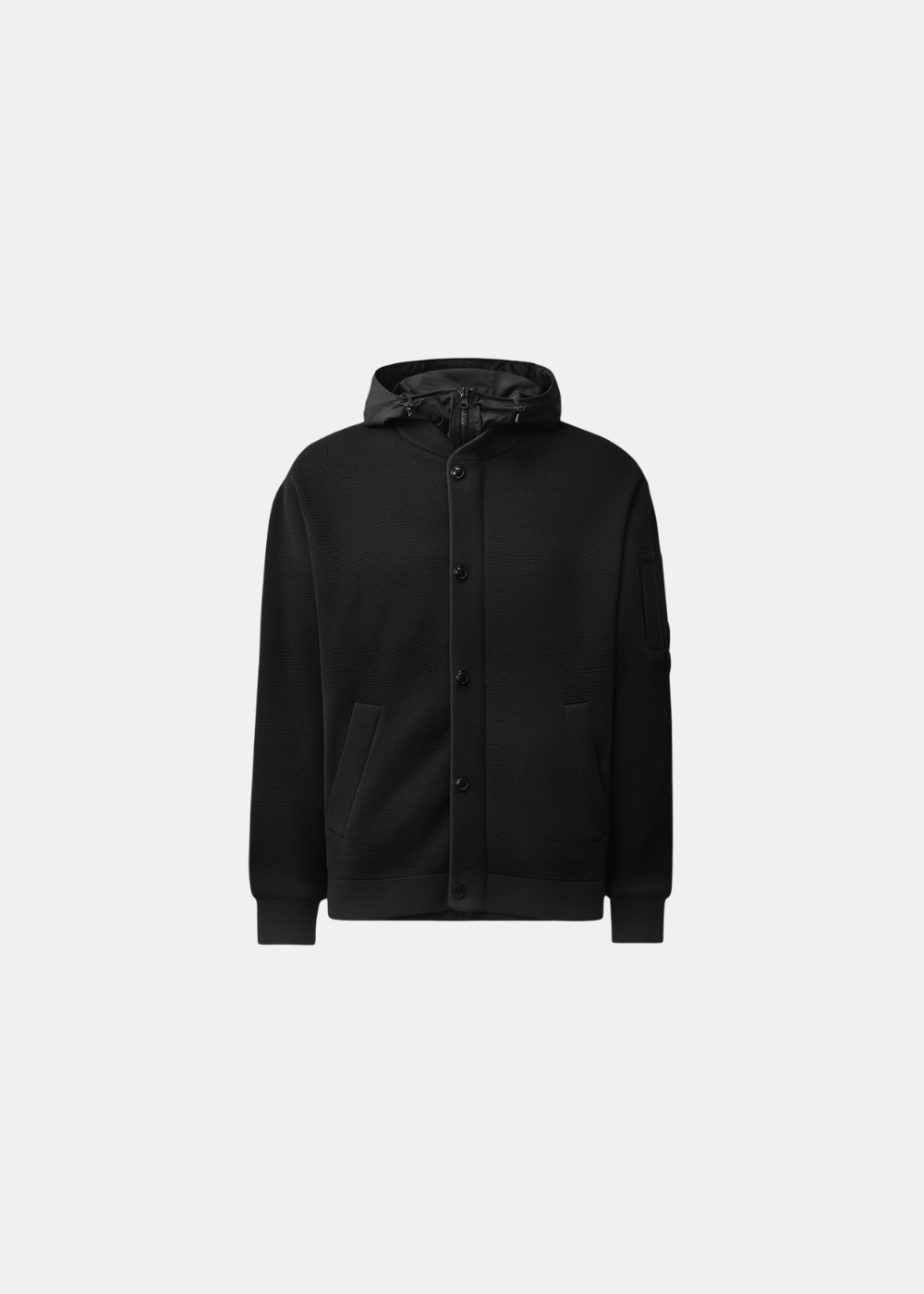 Packshot de face du cardigan homme C.P. Company en laine mérinos noire avec boutonnage central et capuche en nylon sur fond gris clair
