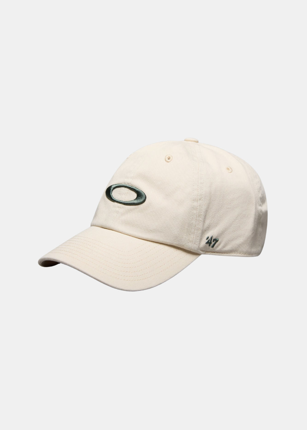 Casquette Dad Hat Oakley Remix 6 pans beige vue de trois-quarts avec logo Ellipse vert brodé et sticker '47 Clean Up