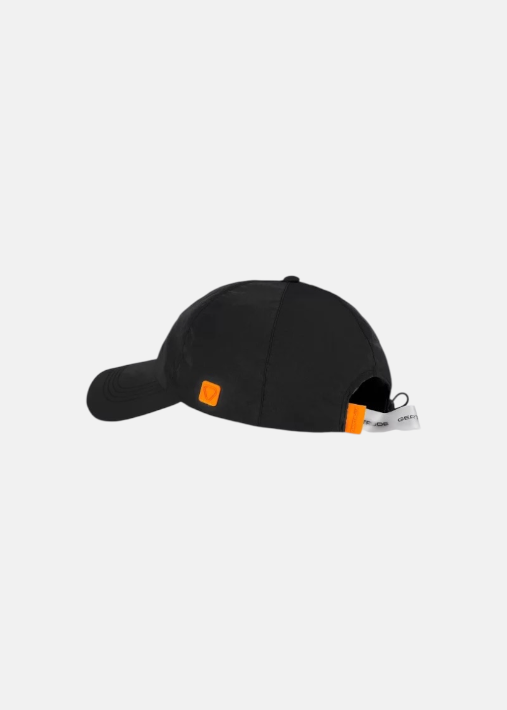 Profil de la casquette Gertrude Jaron noire avec patch latéral orange et doublure de visière contrastée