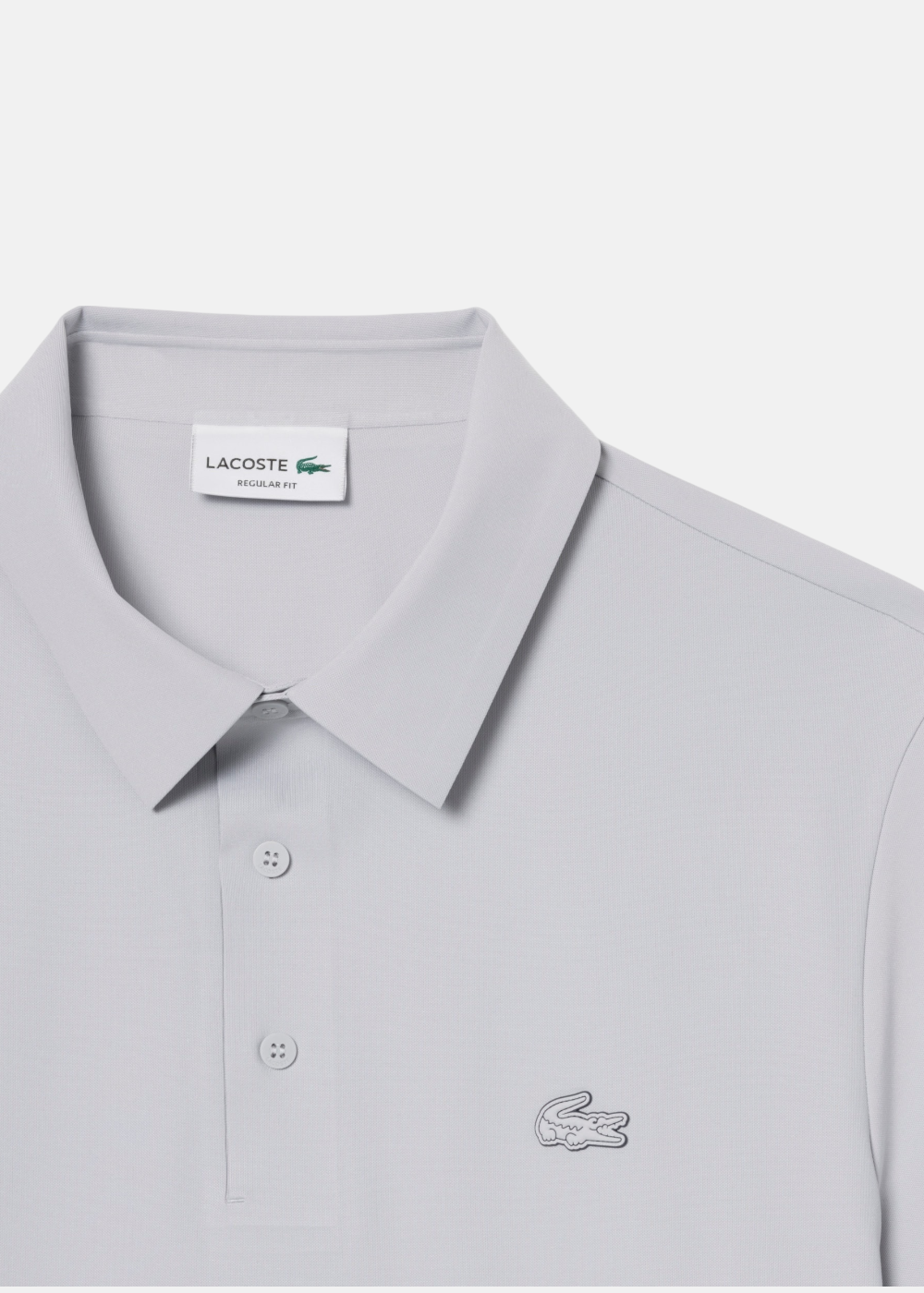 Zoom sur le col et les detail du Polo Homme Lacoste Commuter Technique Gris Clair | Purple Store
