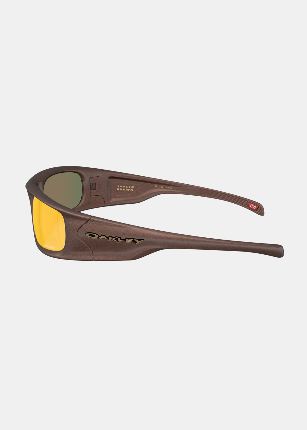 Vue de profil des lunettes Oakley Highland marron soulignant le logo Oakley doré et la signature Jaylen Brown sur la branche.