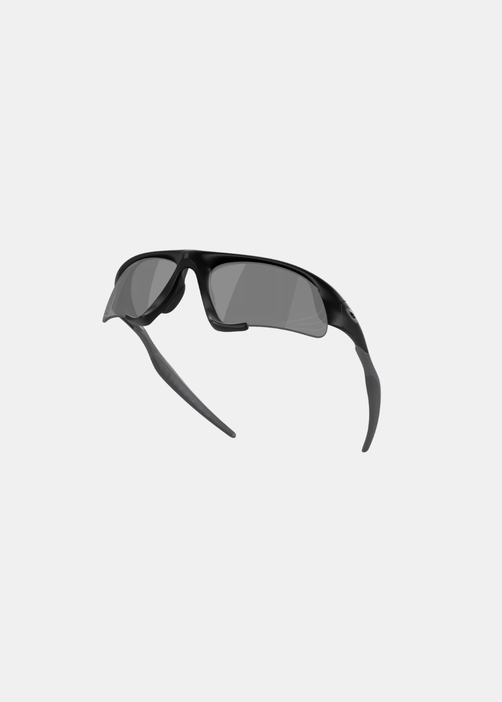 Vue en perspective et surélevée des lunettes de sport Oakley Suture Jacket noires, illustrant la courbure ergonomique de la monture et le positionnement des plaquettes de nez adhérentes