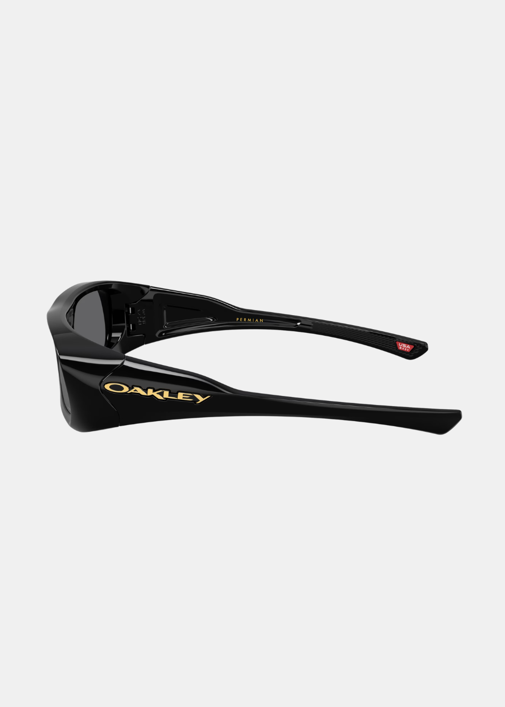 Vue de profil de la branche des lunettes Oakley Permian noires arborant le logo Oakley doré