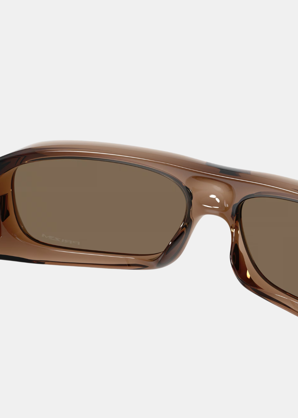 Vue intérieure détaillée de la monture marron translucide et des verres teintés Prizm des lunettes Oakley Permian