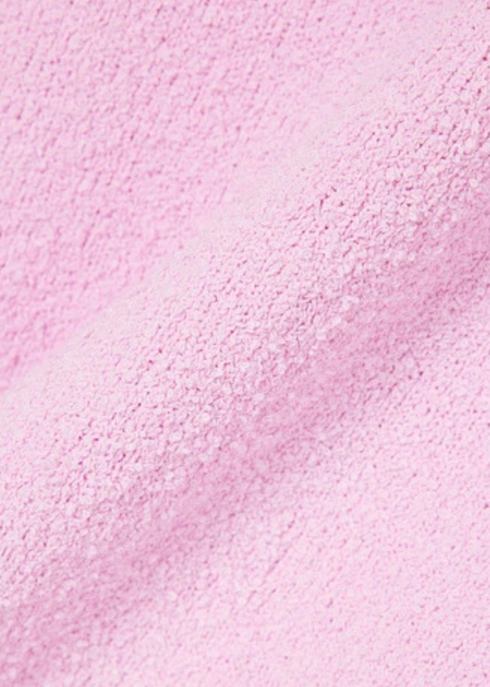 zoom sur le coton du Polo Lacoste en Maille bouclée - rose