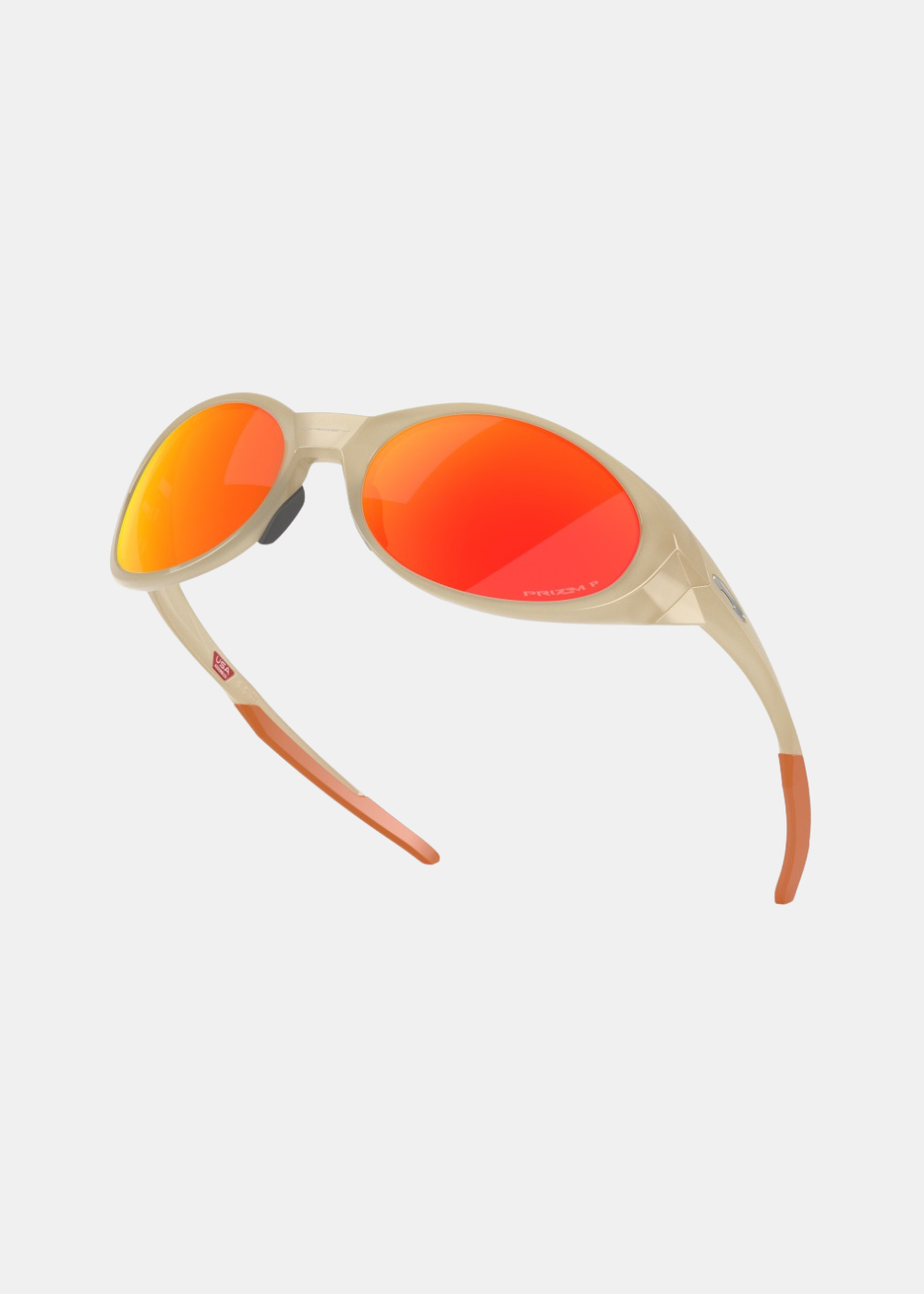 Vue sous un angle plongeant des lunettes Oakley Eyejacket Redux révélant l'intérieur des branches et les manchons orange.