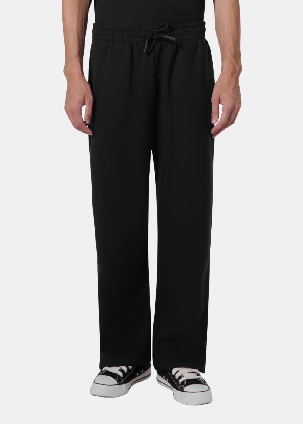 Pantalon de survêtement Homme Gertrude Robbiew noir coupe ample avec taille élastique à cordon de serrage vue de face