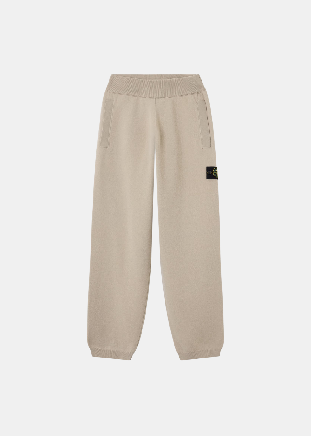 Pantalon de survêtement en maille Stone Island Stretch RWS sable vue de face avec taille élaste et cheville resserrée