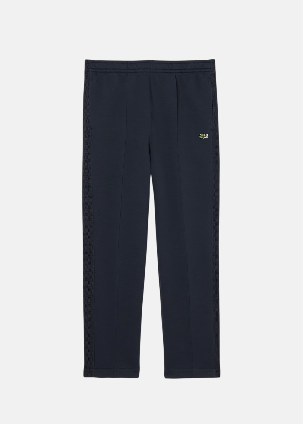Pantalon de survêtement Lacoste bleu marine avec plis marqués et logo crocodile, vue de face.