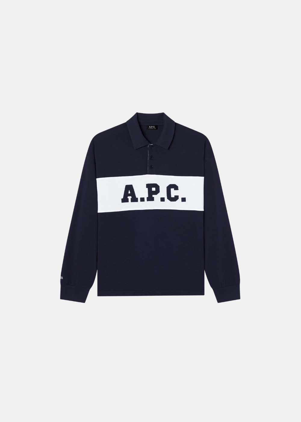 Polo de couleur bleu marine à manches longues A.P.C. Alexis en coton biologique, avec une large bande blanche contrastante sur la poitrine affichant le logo noir A.P.C., présenté de face à plat.