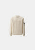 Pull Homme C.P. Company en laine stretch blanc cassé avec col rond et verre de lentille sur la manche