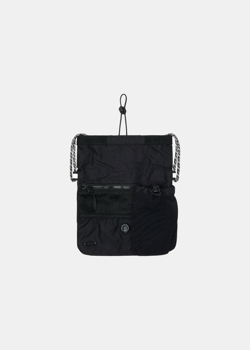Zoom sur la face avant de la sacoche montrant les différentes poches en filet, zippées et le cordon de serrage