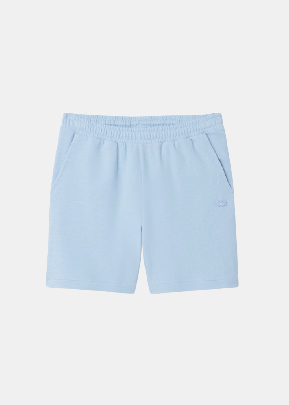 packshot de face du short en jersey bleu clair Lacoste avec cordon de serrage et poches latérale
