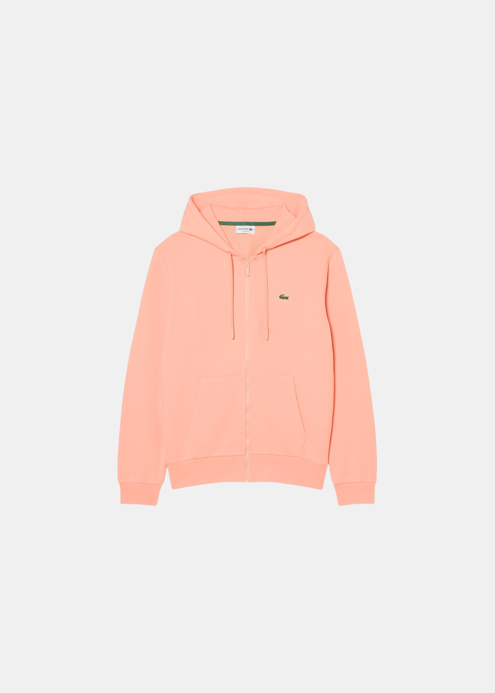Packshot de face du sweatshirt zippé rose corail Lacoste avec poches kangourou et cordon