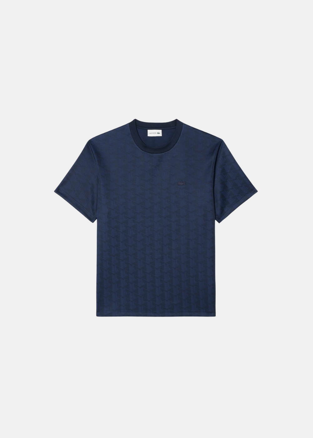Packshot de face du t-shirt Lacoste marine en maille jacquard avec monogramme ton sur ton.