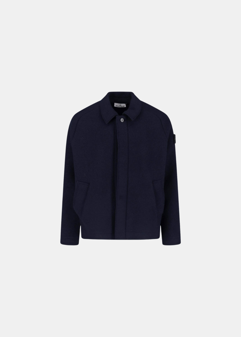 Packshot de face de la veste homme Stone Island Maglia Infeltrita bleu marine avec col chemise et poches latérales