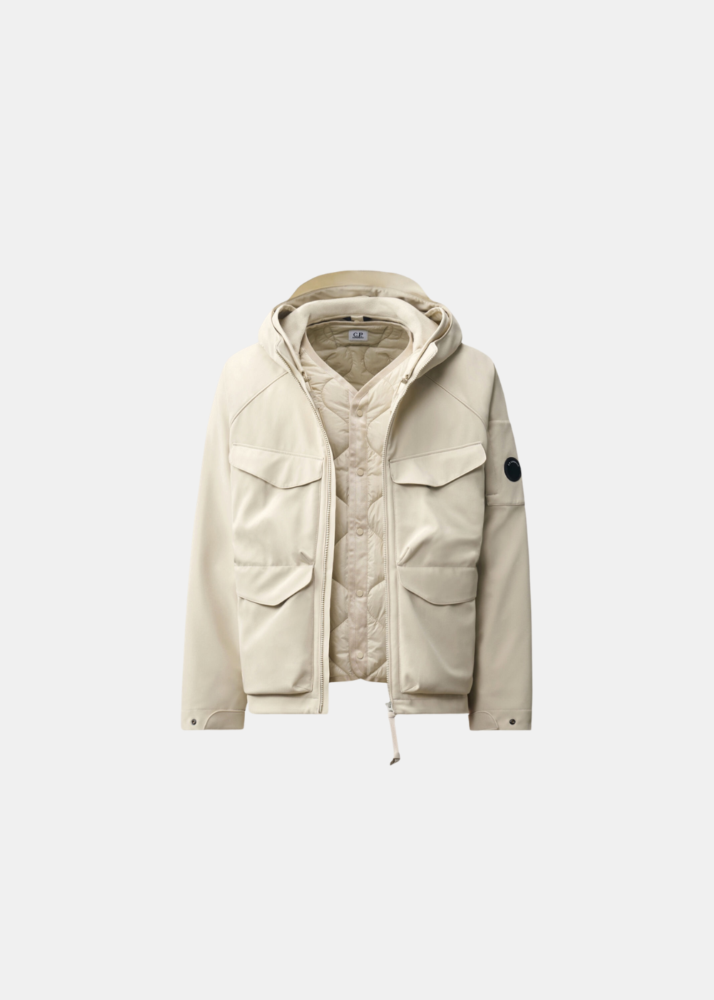 Packshot de la veste réversible beige C.P. Company ouverte dévoilant sa doublure matelassée