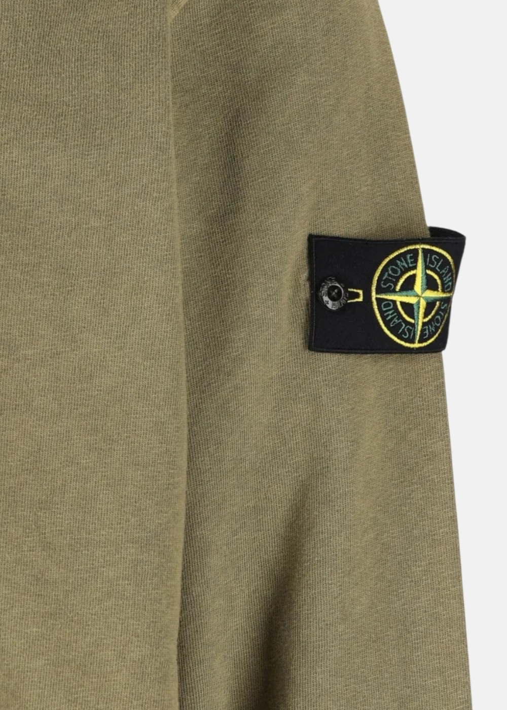 photo zoom sur les matiere et le badge du Sweat à capuche Zippé Stone Island kaki